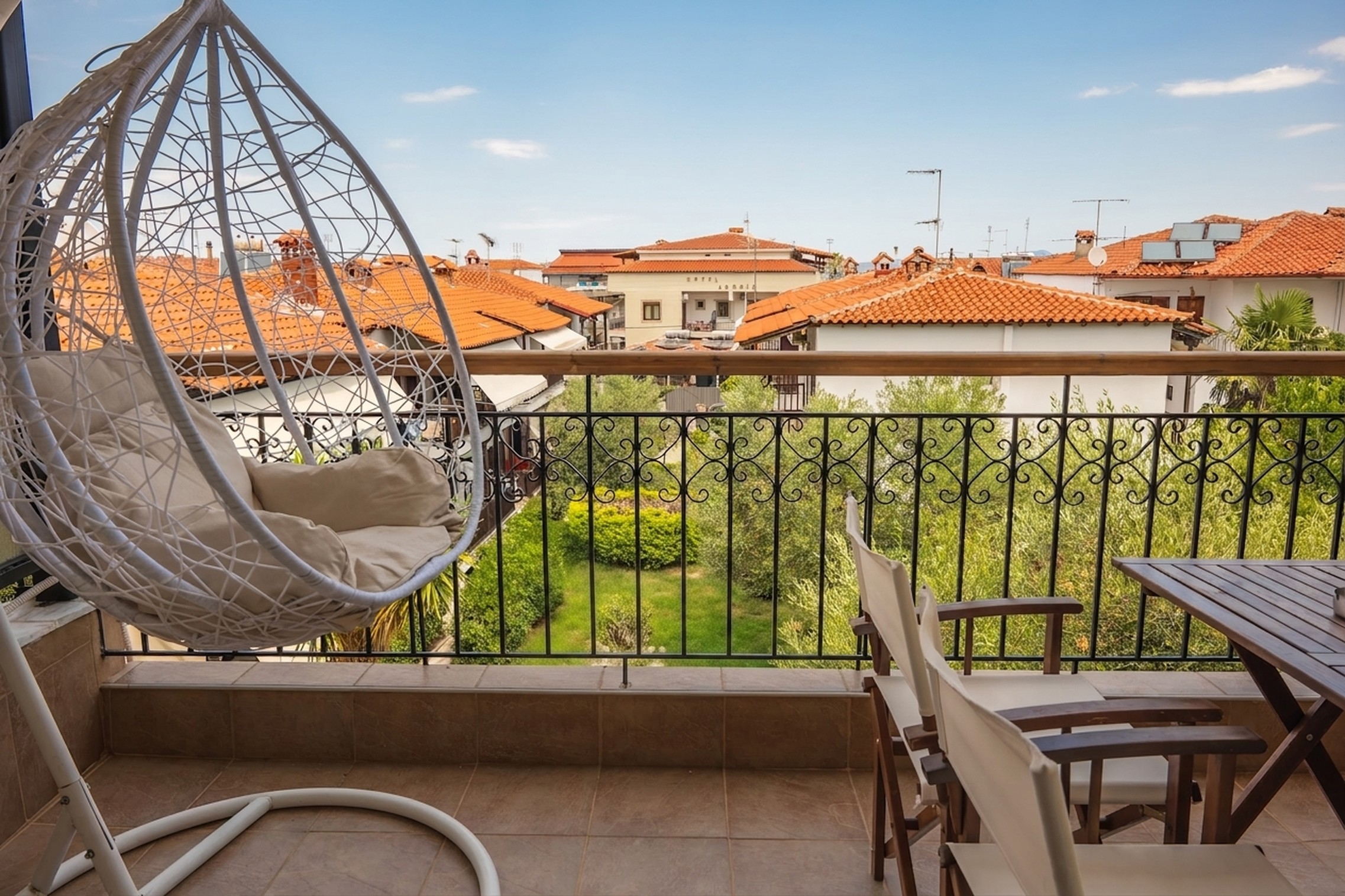 Balcony view over Pefkochori — Nowhere Stay
